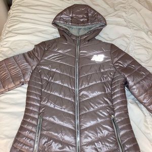 New Balance puff jacket with fuzzy grey interior.